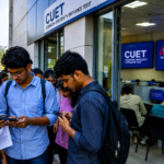 Students wait outside a CUET examination centre during a CUET Exam Delay caused by technical issues affecting computer-based tests.