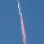 SpaceX Starship rocket launching from Starbase during a flight test