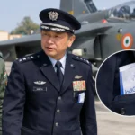Japanese Air Force Chief Takehiro Morita was spotted with an apparent IndiGo airsickness bag during Veer Guardian-2026 in Jodhpur.