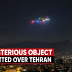 Mysterious multicoloured lights from an unidentified object spotted over Tehran at night