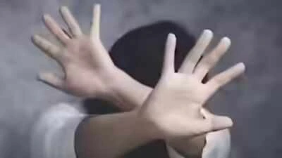 Delhi crime case: symbolic image showing hands raised in a gesture of distress