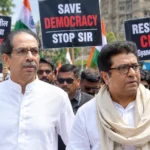 Uddhav Thackeray and Raj Thackeray lead a protest in Mumbai