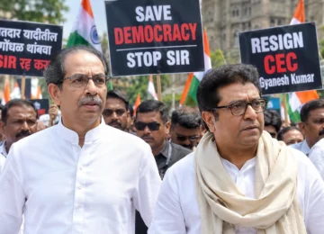 Uddhav Thackeray and Raj Thackeray lead a protest in Mumbai