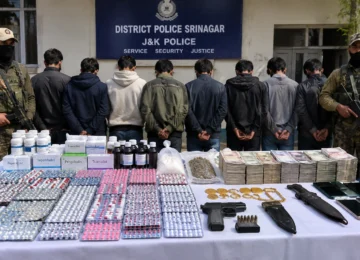 Srinagar drug network bust with seized pharmaceutical tablets and police investigation